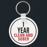 Llavero 1 año limpio y sobrio<br><div class="desc">Camino a seguir - estás un año limpio y sobrio. ¡Celebra tu recuperación de la adicción a las drogas o al alcohol e inspira a otros a hacer lo mismo!</div>