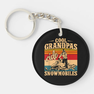 Llavero Abuelos de Guay montan motos de nieve moto de niev