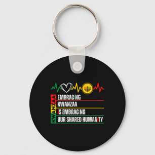 Llavero Adoptar Kwanzaa es nuestra humanidad compartida af