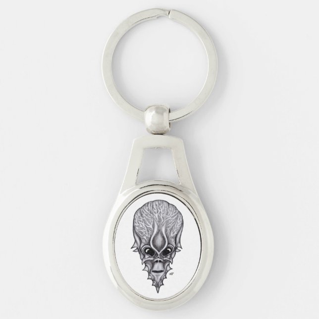 Llavero Alien Face , reconstrucción facial de cráneo afric (Anverso)