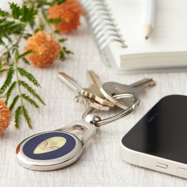 Llavero Alienante de oro (Lateral)