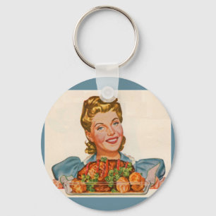 Llavero ama de casa orgullosa con la creación de su cena