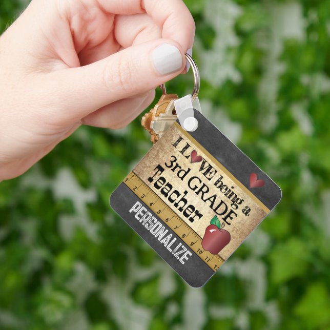 Llavero Amar ser un profesor de tercer grado (Mano)