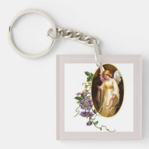 Llavero Ángel con arpa y flores de clemátide