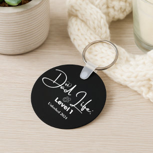 Llavero Año nuevo divertido de nivel 1 de vida de papá nue