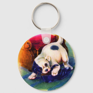 Llavero Años 1930 adorable cachorro número 3 masticando un