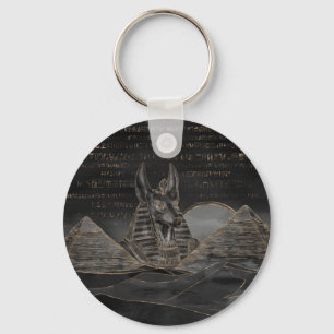 Llavero Anubis en el paisaje de las pirámides egipcias