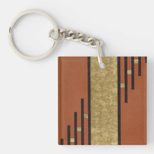 Llavero Art Deco en oro y beige