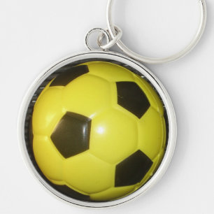 Llavero Arte de Fútbol Vibrante Amarillo y Negro