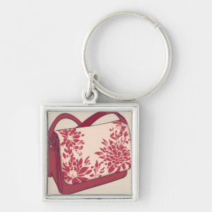 Llavero Arte de IA beige y rojo floral