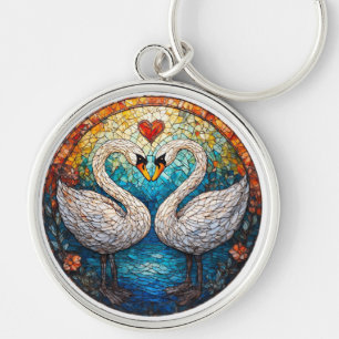 Llavero Arte en mosaico que representa cisnes blancos