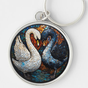 Llavero Arte en mosaico que representa cisnes negros y bla