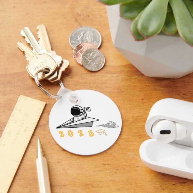 Llavero astronauta fuera de este mundo de la cadena de cla (Escritorio )