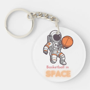 Llavero Astronauta jugando baloncesto en la tee espacial