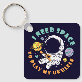 Llavero Astronauta Kawaii jugando al Ukulele en el espacio