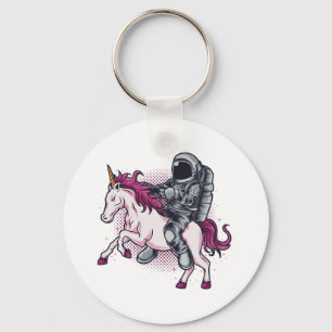 Llavero Astronauta montando una camiseta de Unicornio rosa
