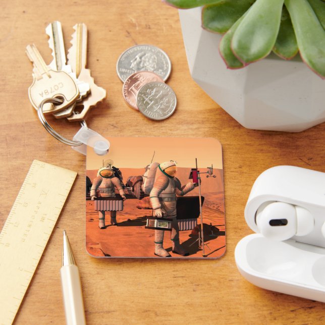 Llavero Astronautas Instalando Equipo Meteorológico En Mar (Escritorio )