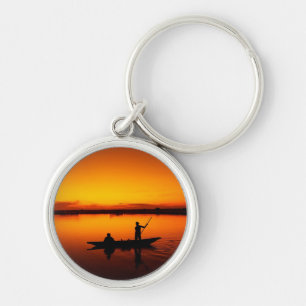 Llavero Atardecer, barco de remo en el mar