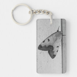 Llavero B&W - Ophiusa tirhaca, el hueco verde