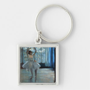 Llavero Bailarín de Edgar Degas el delante de una