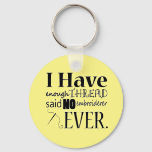 Llavero Basta de bordado de hilo