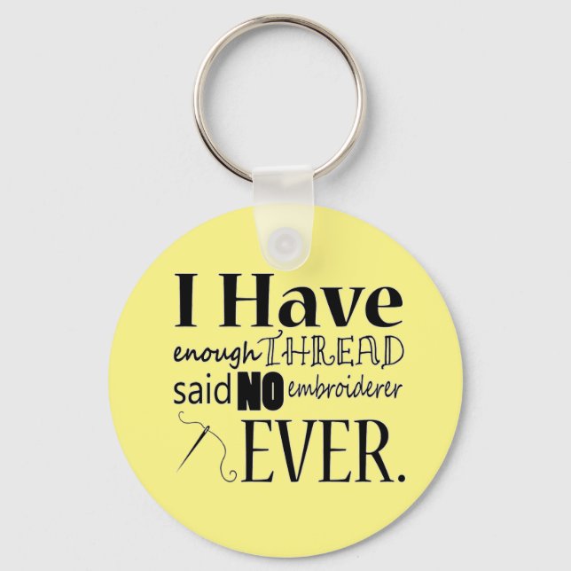 Llavero Basta de bordado de hilo (Anverso)