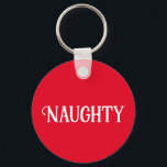 Llavero Bastante traviesa<br><div class="desc">¿Eres travieso o agradable? Este keychain de vacaciones de Navidades tiene dos lados para ambos estados de ánimo.</div>
