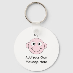 Llavero Bebé sonriente lindo. Texto de encargo