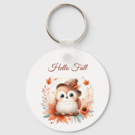 Llavero Bechuza de otoño sentada en una rama