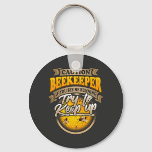 Llavero Beekeeper TRATA DE MANTENERSE AL TANTO