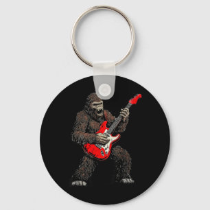 Llavero Bigfoot tocando guitarra banda de rock Sasquatch