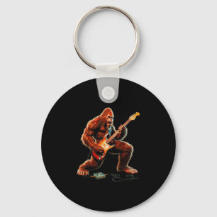 Llavero Bigfoot tocando guitarra eléctrica guitarrista div