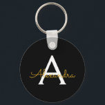 Llavero Black Gold Modern Script Girly Monograma Nombre<br><div class="desc">Cadena de claves de nombres de monograma simple de guiones negros y dorados (cadena de claves). Esto hace que el dulce perfecto cumpleaños 16,  boda,  ducha de novia,  aniversario,  ducha de bebé o fiesta de soltera sea regalo para alguien que ama el lujo glam y los estilos de moda.</div>