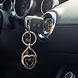 Llavero Black metal keychain with a pink and red heart