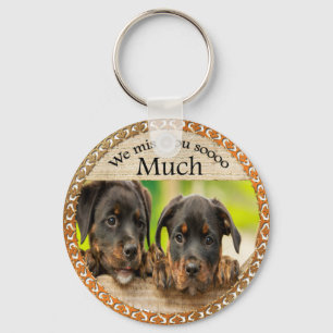 Llavero Black Rottweiler perros adorables con caras triste