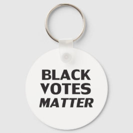 Llavero "Black Votes Materia" blanco negro