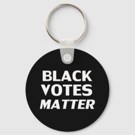 Llavero "Black Votes Materia" blanco negro