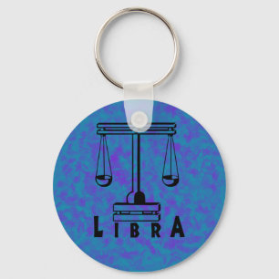 Llavero blanco y negro del libra