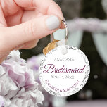 Llavero Boda de la dama de honor Regalo Cassis Lacia morad<br><div class="desc">Estas cadenas están diseñadas para dar como favores a las damas de honor en tu fiesta de bodas. Presentan un diseño sencillo pero elegante con fondo blanco, magenta o cassis de texto morado y gris, y un Relieve metalizado falso plateado con borde floral. ¡Una forma perfecta de agradecer a sus...</div>