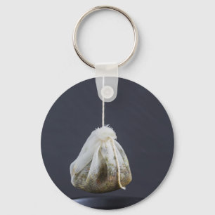 Llavero Bolsa de té colgada en una taza