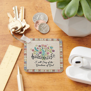 Llavero Bondad de Dios aspecto acolchado floral música