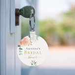 Llavero Bridal Shower rosa oro floral eucalipto favor<br><div class="desc">Un fondo blanco moda. Decorada con un oro rosa, floral rosa rosa, floral (rosa) y hojas de eucalipto de color verde acuático y verde, brotes, vegetación y una falsa primavera dorada. Personaliza y agrega el nombre de la novia. Letras negras y doradas. Perfecto como un gran favor y de partido....</div>