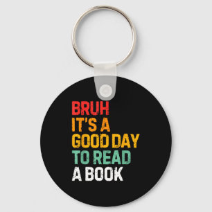 Llavero Bruh un buen día para leer un libro lectura genial