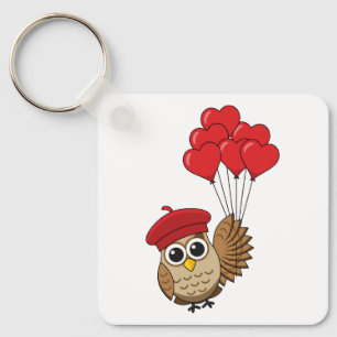 Llavero Búho lindo volando con globos cardíacos