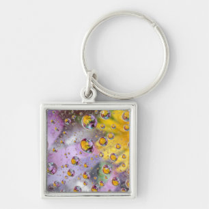 Llavero Burbujas abstractas con flores. Crédito como:Nanc
