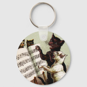 Llavero C. 19. Cantando gatos