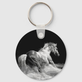 Llavero Caballo blanco y negro en acción