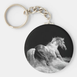 Llavero Caballo blanco y negro en acción