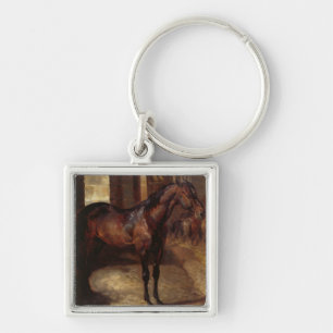 Llavero Caballo de bahía oscuro en el establo