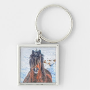 Llavero Caballo de invierno en campo de nieve 2